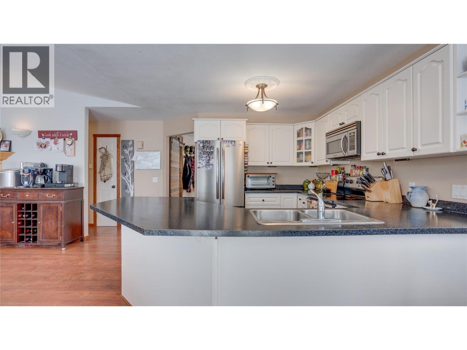 2086 Yankee Flats Road, Salmon Arm, BC - Indoor Photo Showing Kitchen With Double Sink