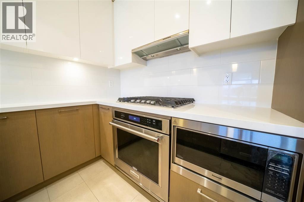 1905 3080 Lincoln Avenue, Coquitlam, BC - Indoor Photo Showing Kitchen With Stainless Steel Kitchen With Upgraded Kitchen