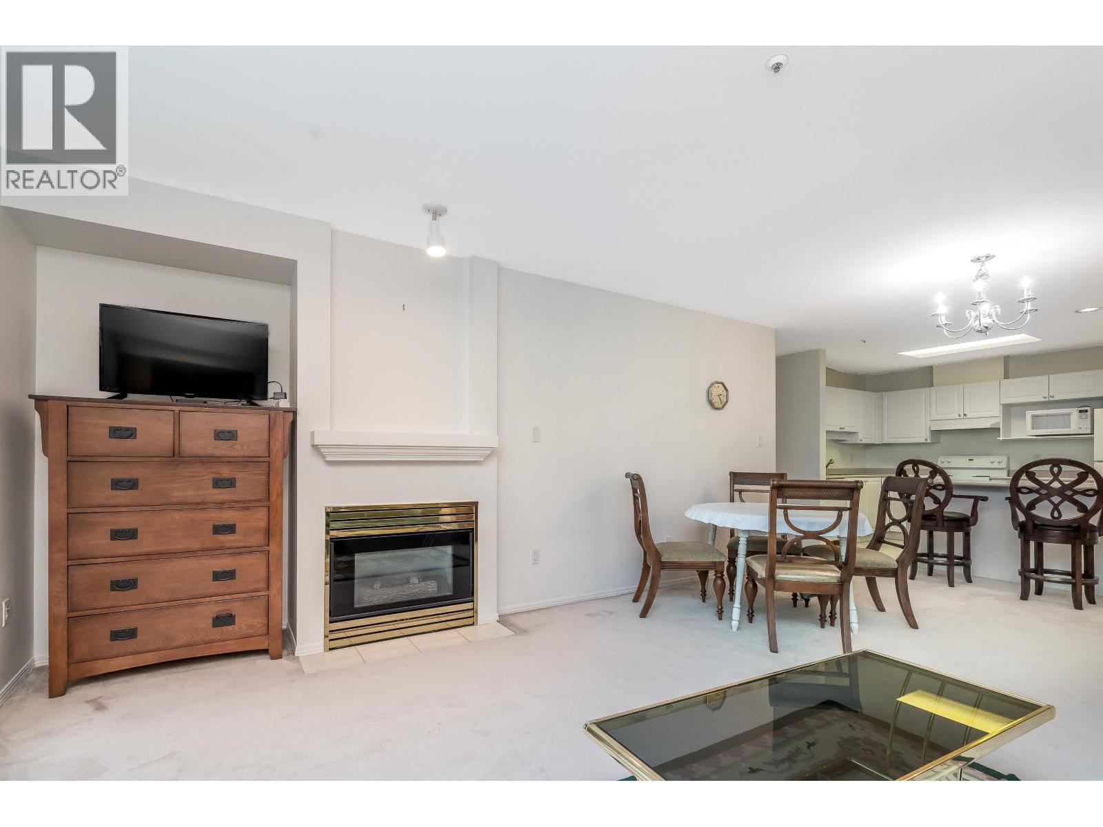 208 2968 Burlington Drive, Coquitlam, BC - Indoor With Fireplace
