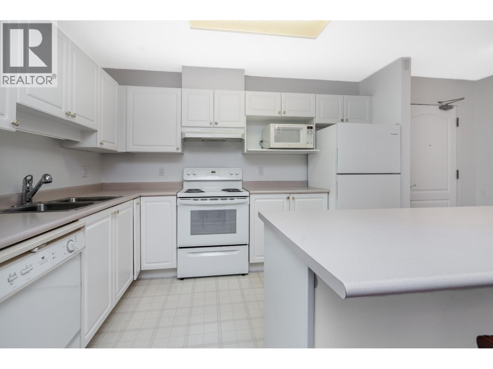 208 2968 Burlington Drive, Coquitlam, BC - Indoor Photo Showing Kitchen With Double Sink