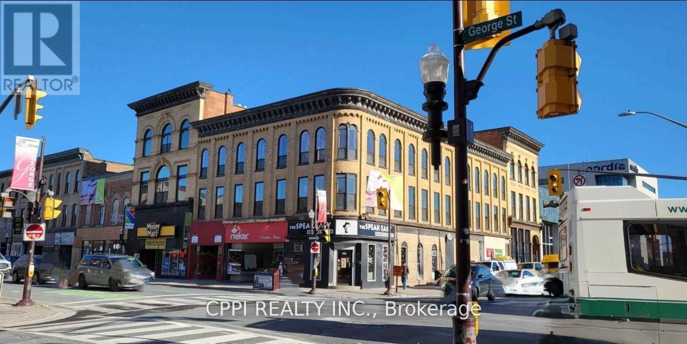 201 - 140 Simcoe Street, Peterborough, ON - Outdoor With Facade