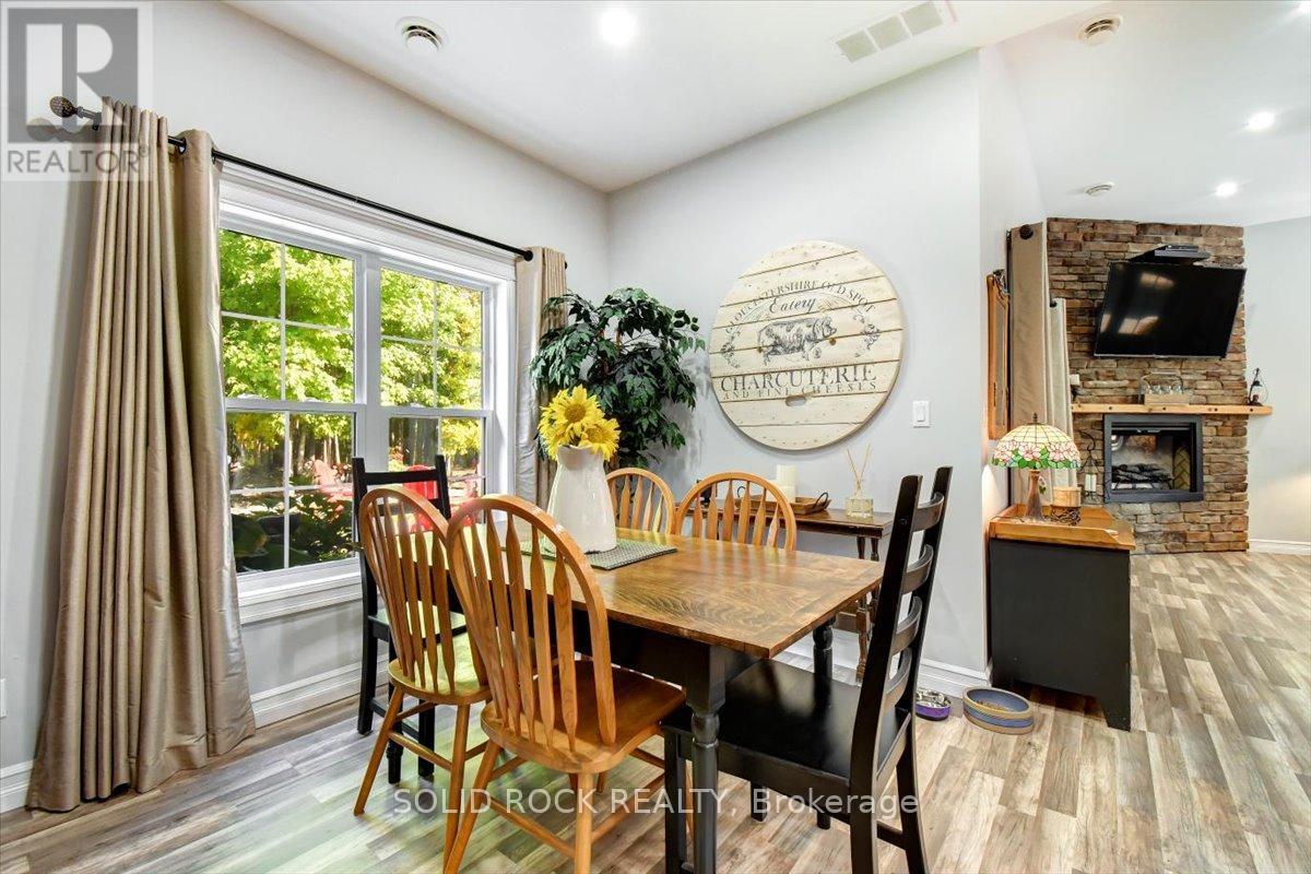 400 Pigden Road, Madoc, ON - Indoor Photo Showing Dining Room With Fireplace