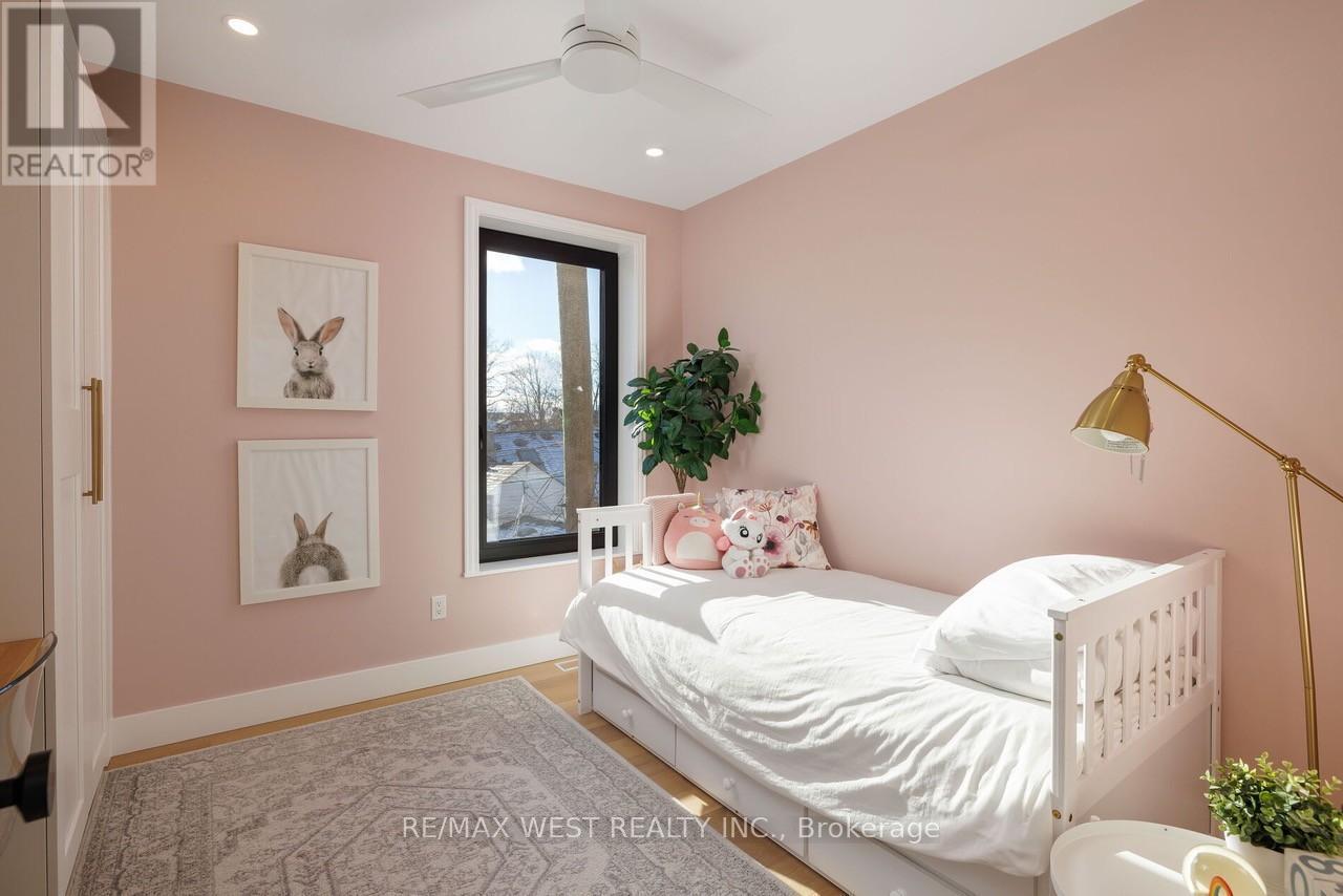 22 Cowan Avenue, Toronto, ON - Indoor Photo Showing Bedroom