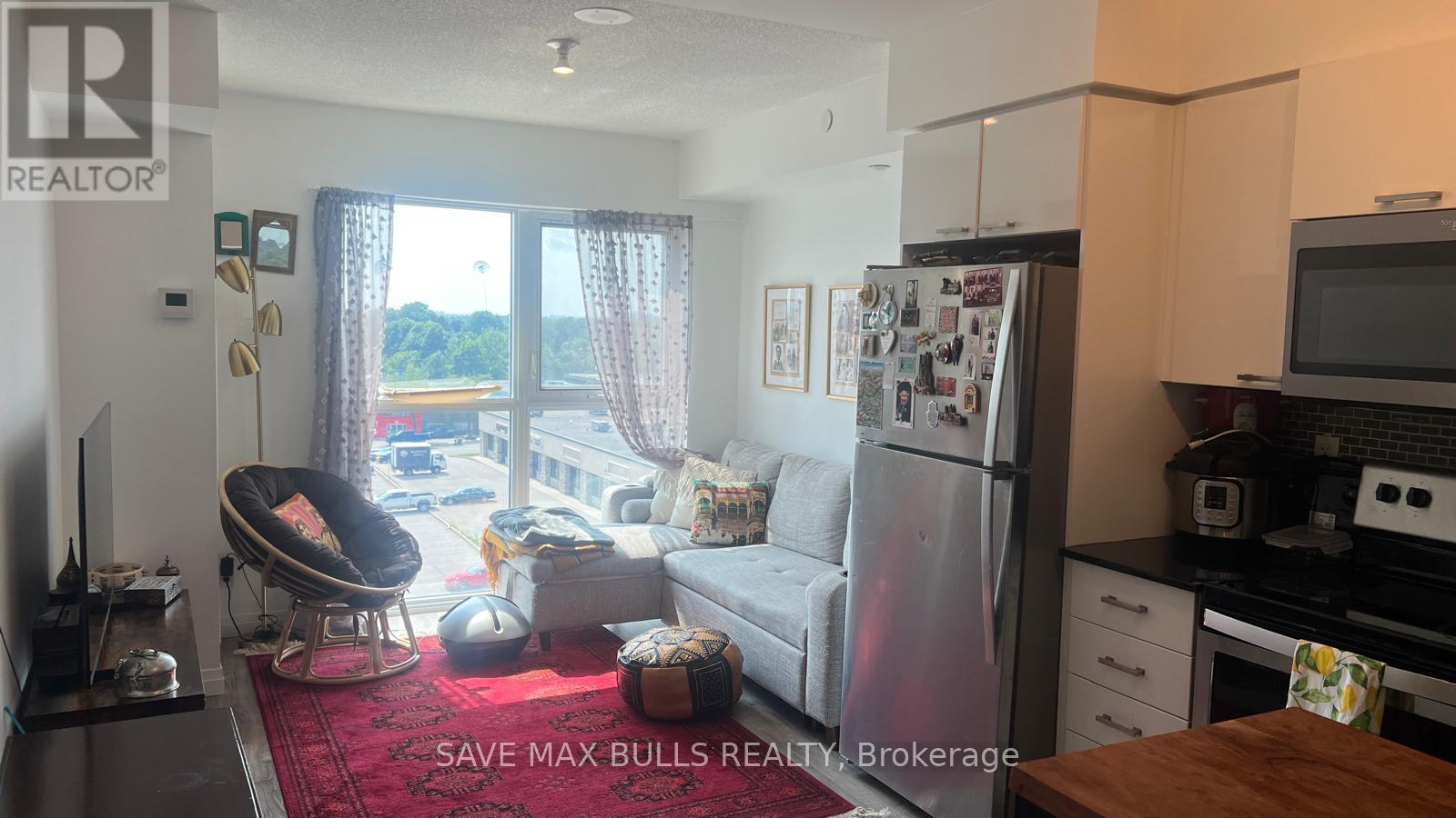 709 - 2150 Lawrence Avenue E, Toronto, ON - Indoor Photo Showing Kitchen With Stainless Steel Kitchen