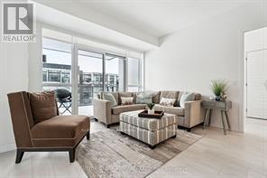 328 - 415 Sea Ray Avenue, Innisfil, ON - Indoor Photo Showing Living Room