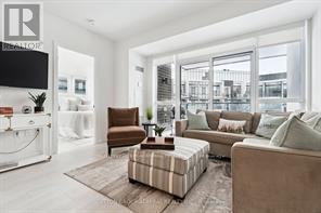 328 - 415 Sea Ray Avenue, Innisfil, ON - Indoor Photo Showing Living Room