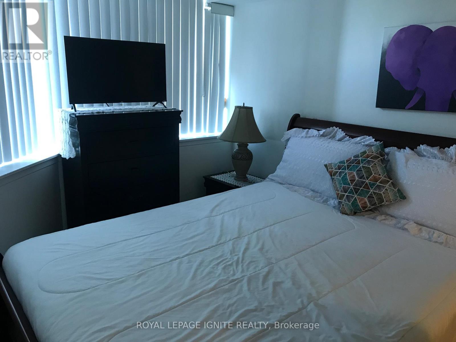 420 - 11753 Sheppard Avenue E, Toronto, ON - Indoor Photo Showing Bedroom