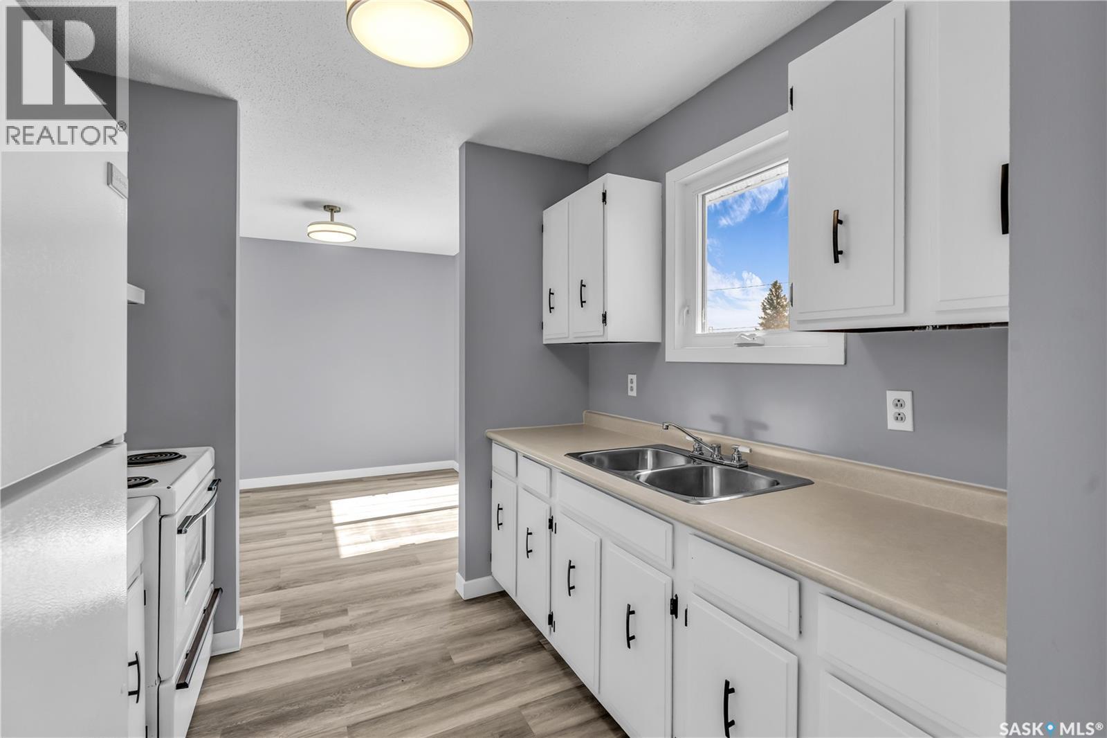 325 Riverside Drive, St. Louis, SK - Indoor Photo Showing Kitchen With Double Sink