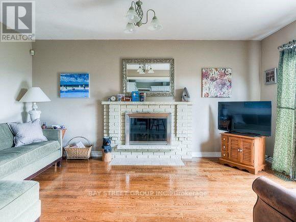 15 Kathrose Drive, Toronto, ON - Indoor Photo Showing Living Room With Fireplace