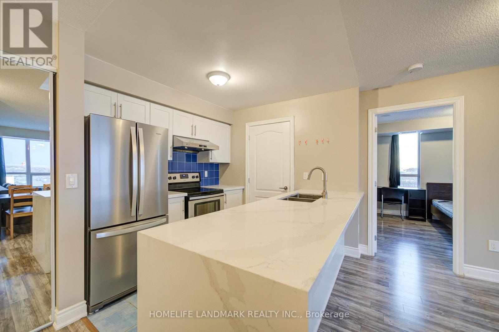807 - 50 Brian Harrison Way, Toronto, ON - Indoor Photo Showing Kitchen With Double Sink