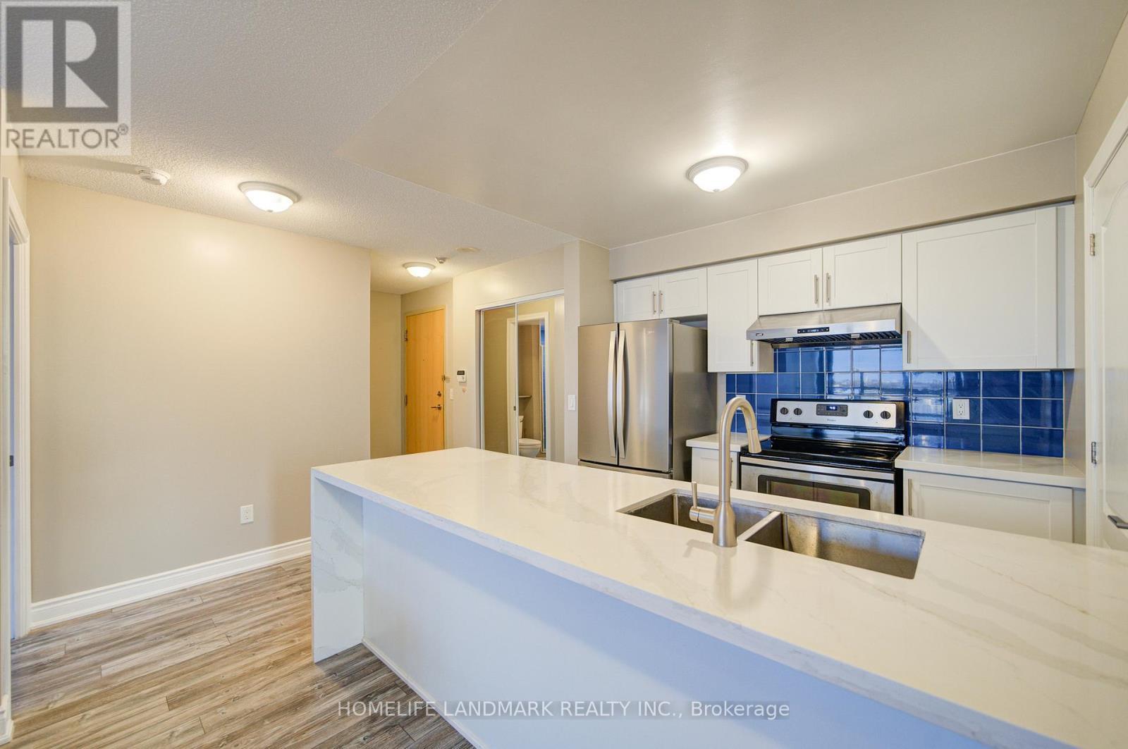 807 - 50 Brian Harrison Way, Toronto, ON - Indoor Photo Showing Kitchen With Double Sink