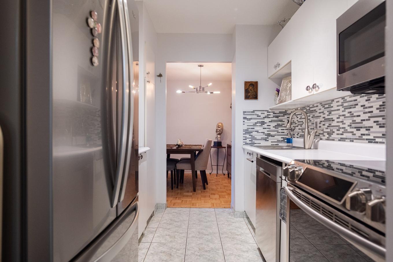 Cuisine - 216-2555 Av. Du Havre-Des-Îles, Laval (Chomedey), QC - Indoor Photo Showing Kitchen With Upgraded Kitchen