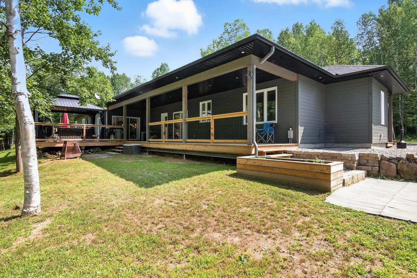 Back facade - 90 Ch. Du Huard, Val-Des-Bois, QC - Outdoor With Deck Patio Veranda
