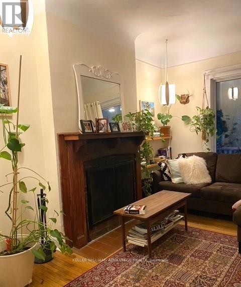 Apt 1 - 26 Indian Road, Toronto, ON - Indoor Photo Showing Living Room With Fireplace