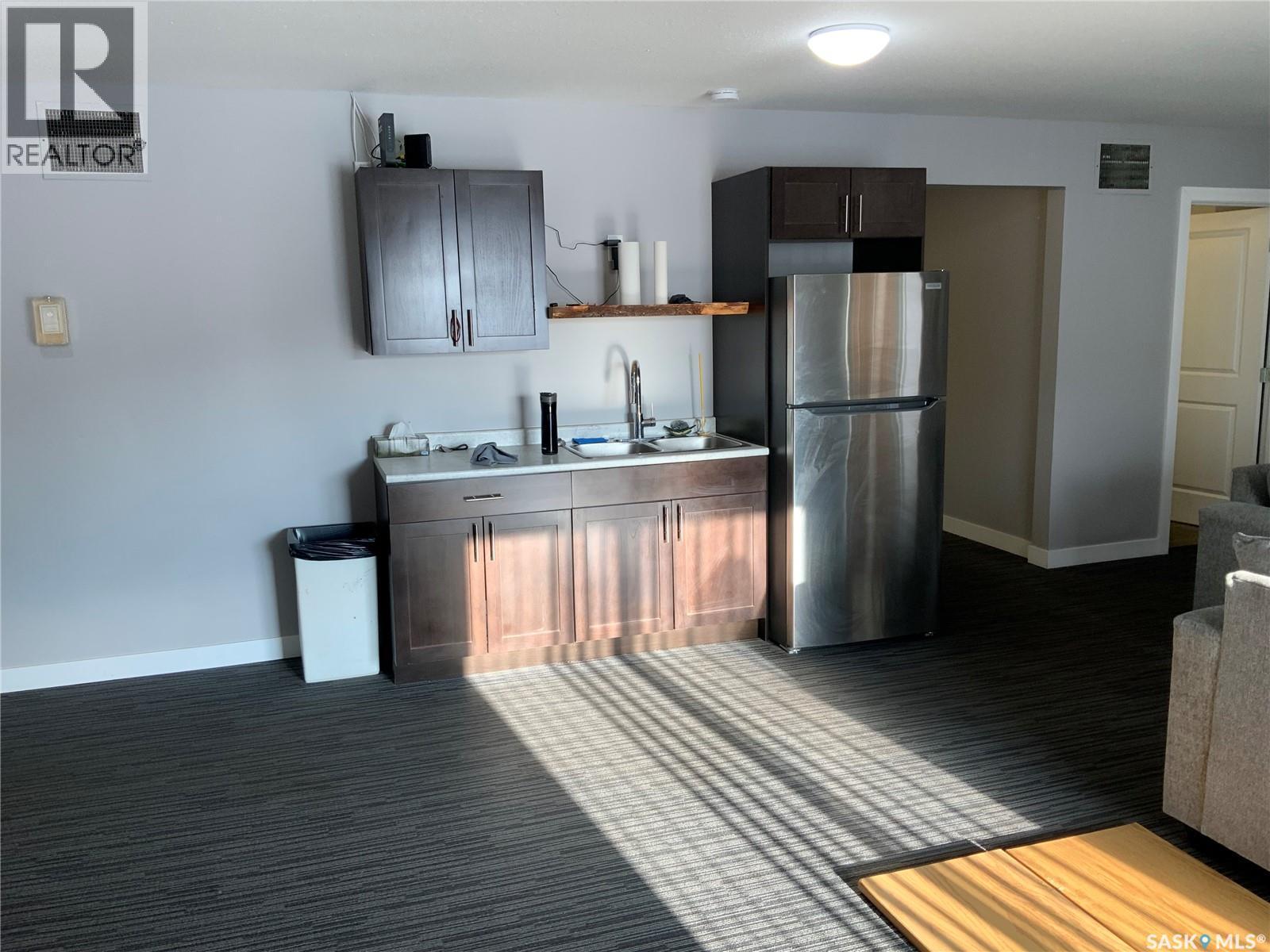 201 245 Kingsmere Boulevard, Saskatoon, SK - Indoor Photo Showing Kitchen With Double Sink