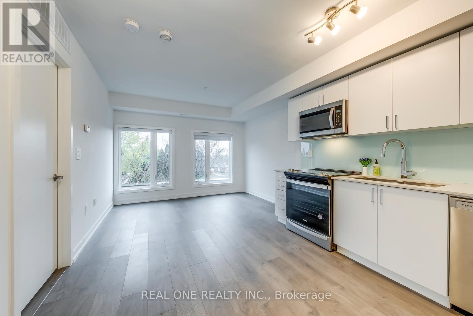 C221 - 1660 Victoria Park Avenue, Toronto, ON - Indoor Photo Showing Kitchen With Double Sink