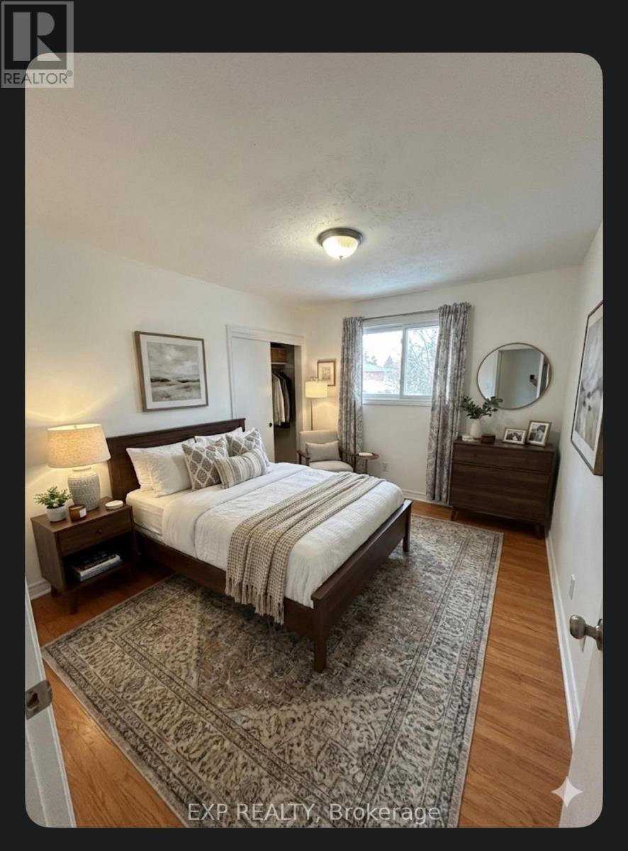 bedroom virtually staged - Upper - 611 Geneva Street, St. Catharines (Lakeport), ON - Indoor Photo Showing Bedroom