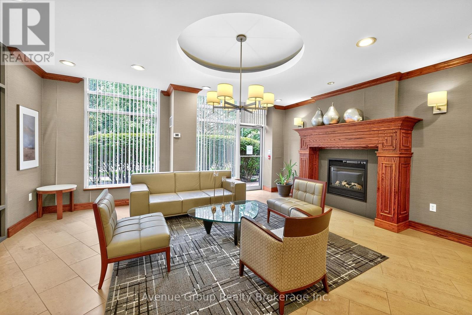 714 - 19 Barberry Place, Toronto, ON - Indoor Photo Showing Living Room With Fireplace
