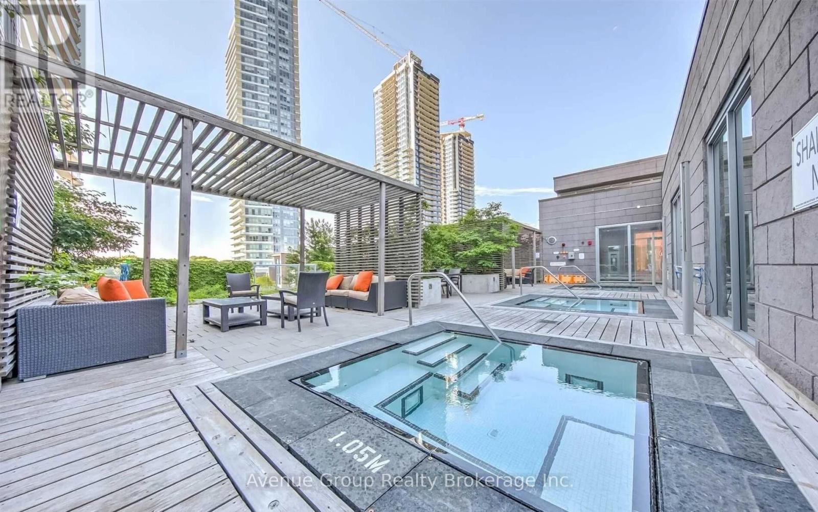 2917 - 121 Mcmahon Drive, Toronto, ON - Outdoor With In Ground Pool With Deck Patio Veranda With Exterior