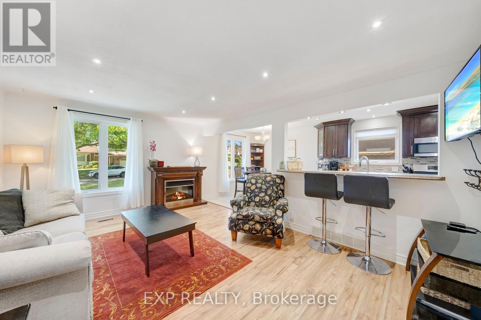 25 Ziraldo Road, St. Catharines (Martindale Pond), ON - Indoor Photo Showing Living Room With Fireplace