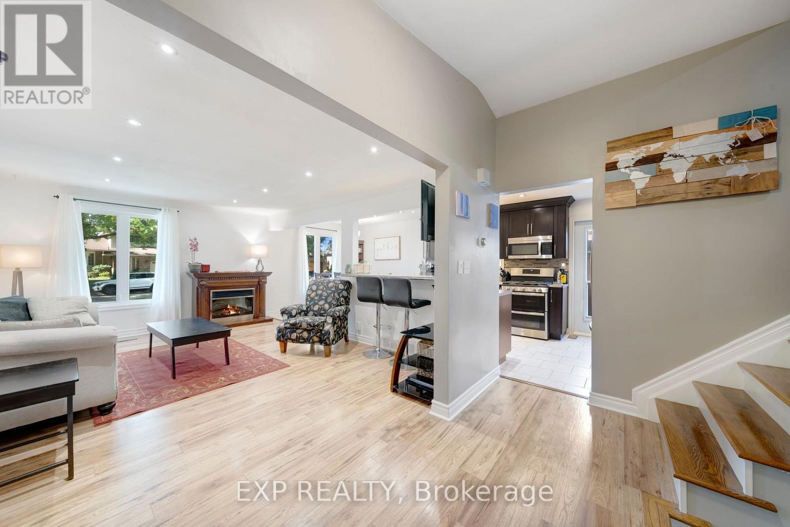 25 Ziraldo Road, St. Catharines (Martindale Pond), ON - Indoor Photo Showing Living Room With Fireplace