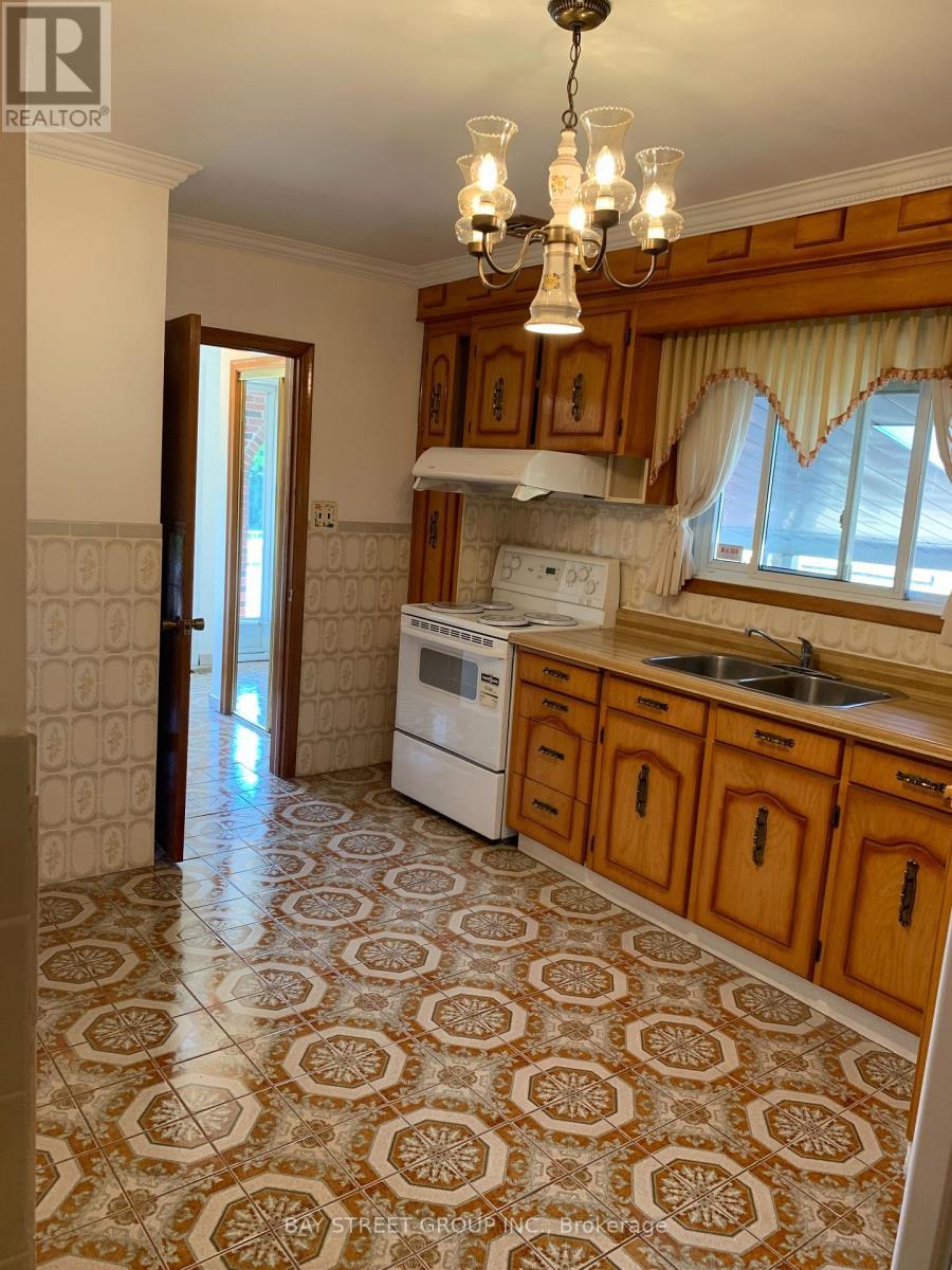Main - 126 Cass Avenue, Toronto, ON - Indoor Photo Showing Kitchen With Double Sink