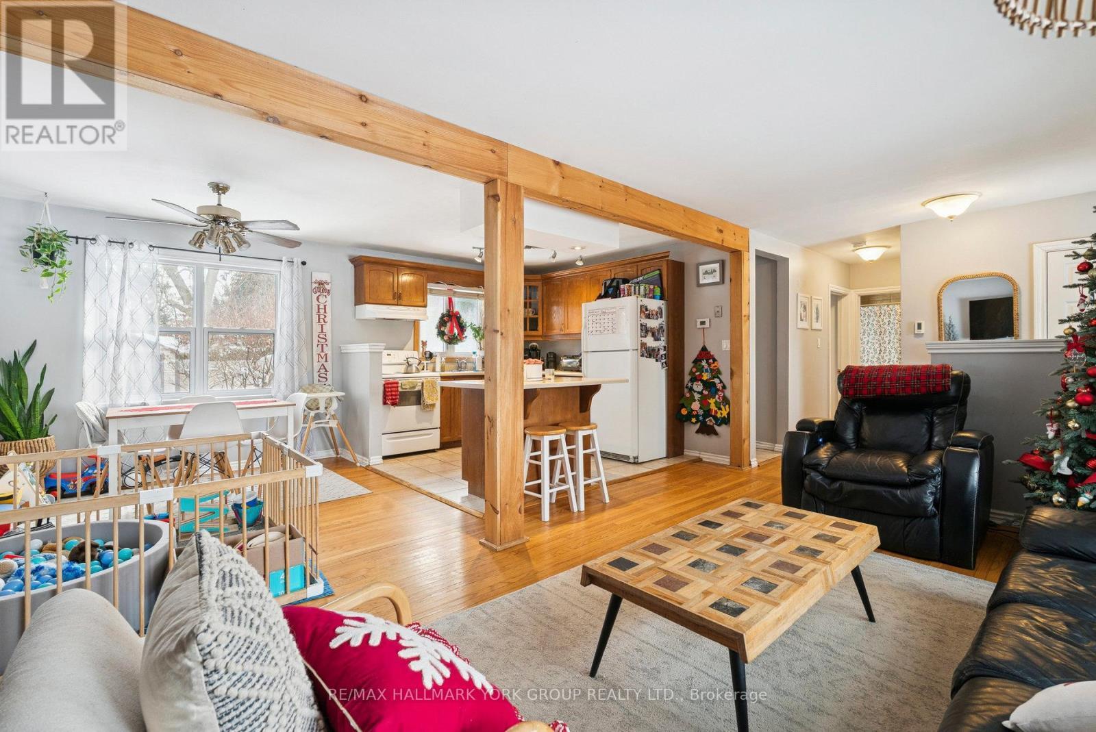 Open Concept Main Living Area with Stunning Beams - 1 Middle Street, Georgina, ON - Indoor Photo Showing Living Room