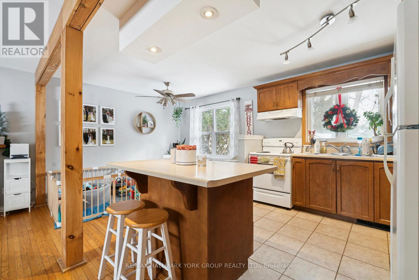 Bright Kitchen with Island - 1 Middle Street, Georgina, ON - Indoor Photo Showing Kitchen With Double Sink
