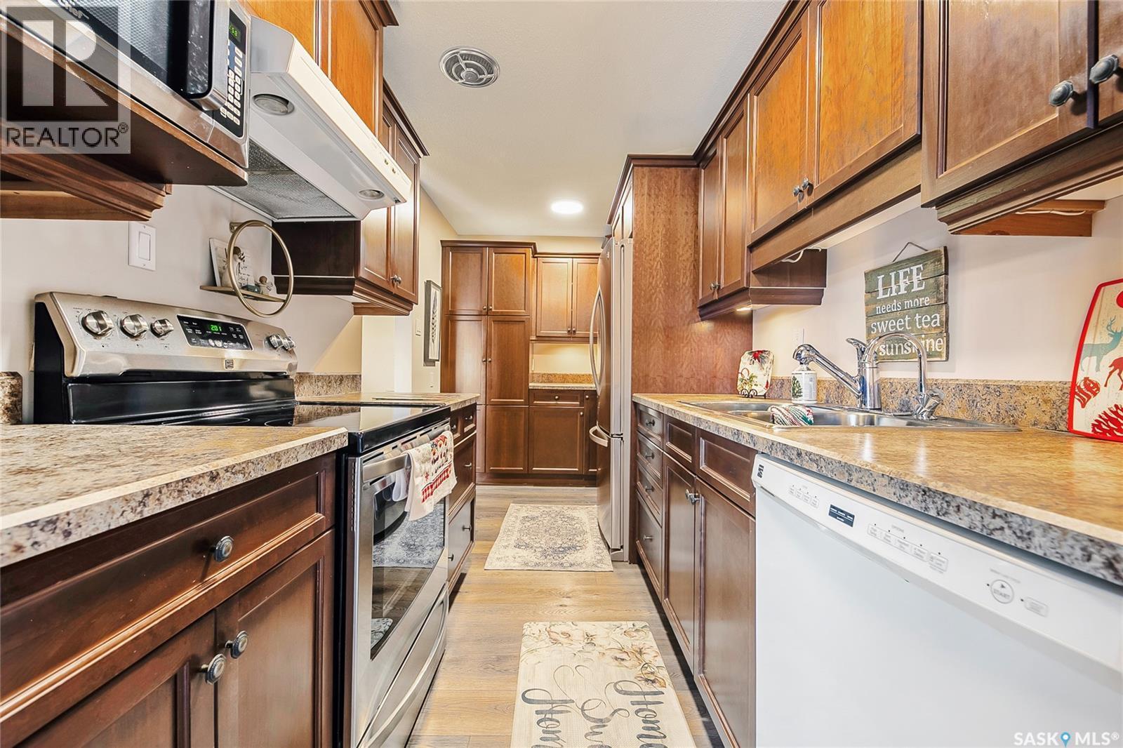 601 4555 Rae Street, Regina, SK - Indoor Photo Showing Kitchen With Double Sink