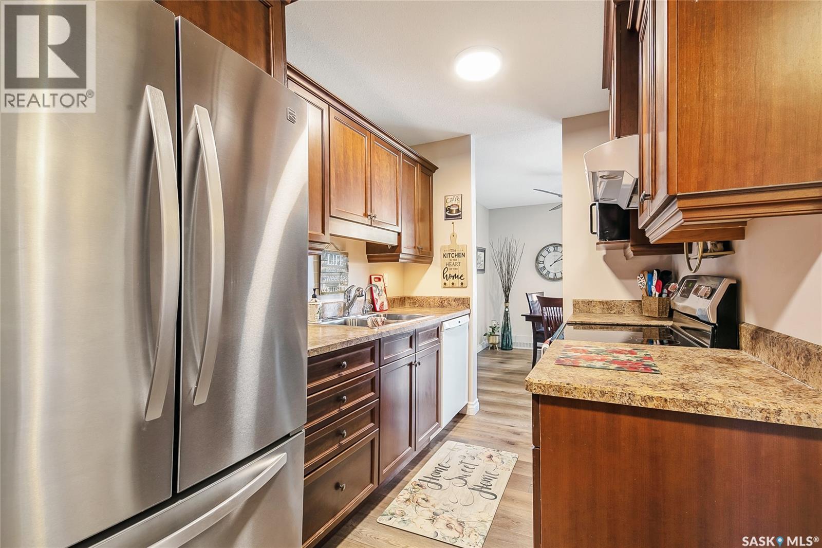 601 4555 Rae Street, Regina, SK - Indoor Photo Showing Kitchen With Stainless Steel Kitchen With Double Sink