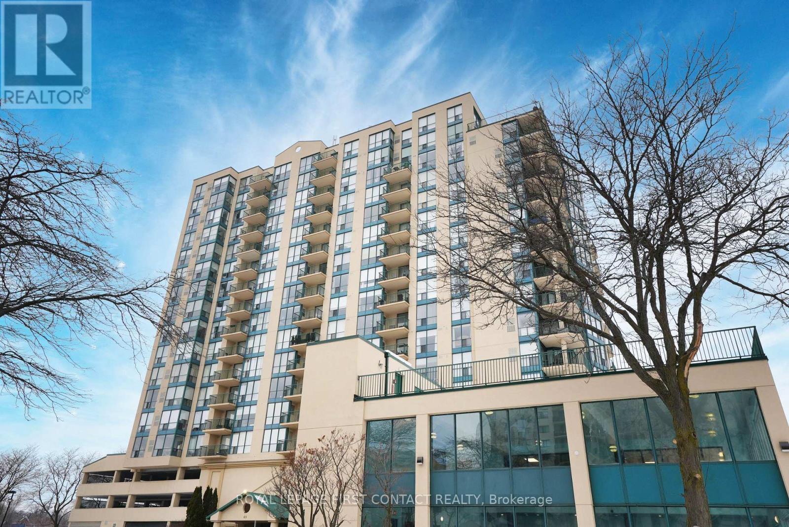 902 - 65 Ellen Street, Barrie, ON - Outdoor With Balcony With Facade
