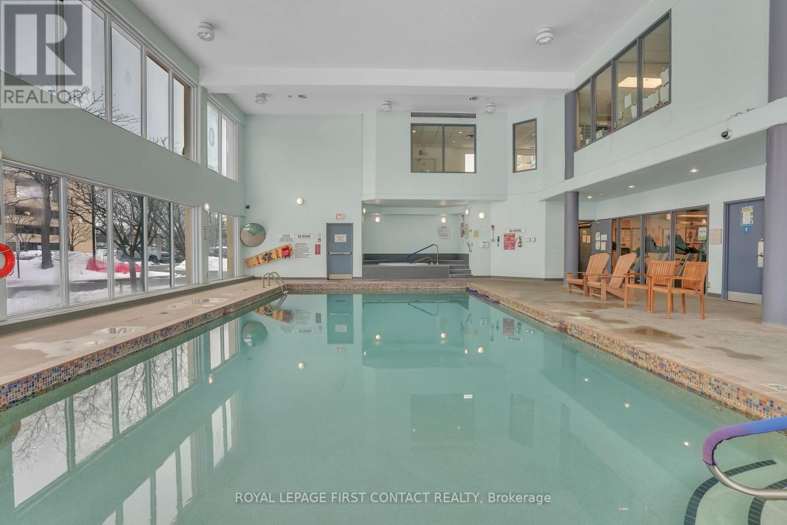 902 - 65 Ellen Street, Barrie, ON - Indoor Photo Showing Other Room With In Ground Pool