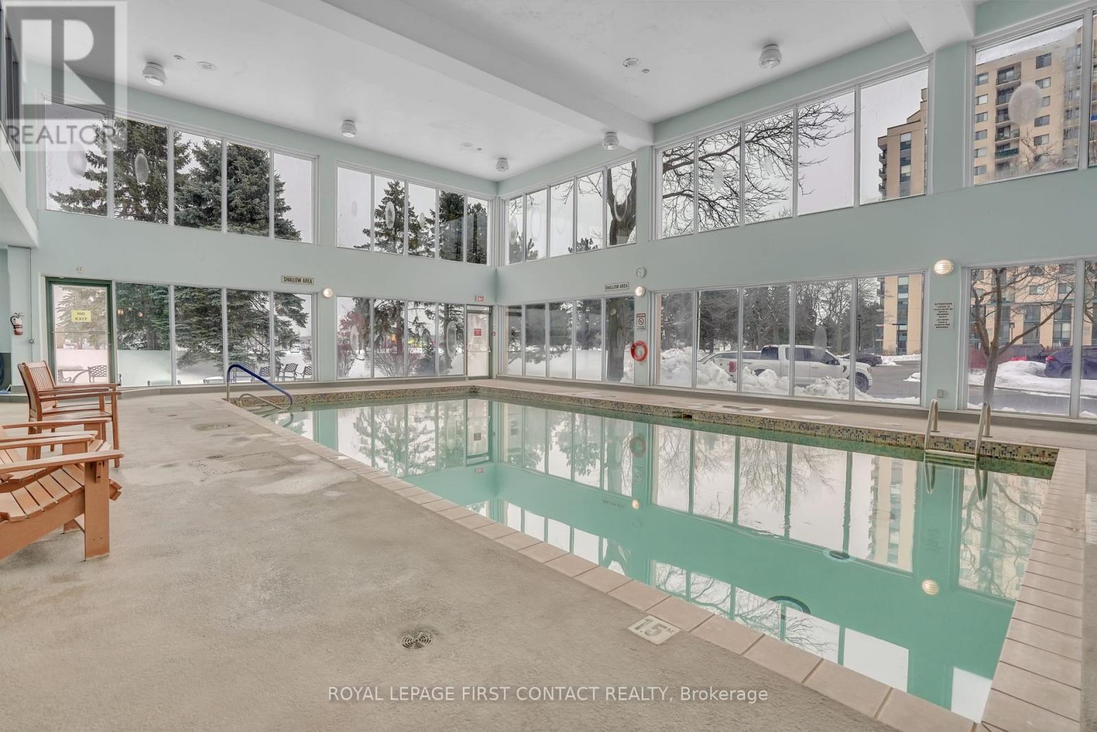 902 - 65 Ellen Street, Barrie, ON - Indoor Photo Showing Other Room With In Ground Pool