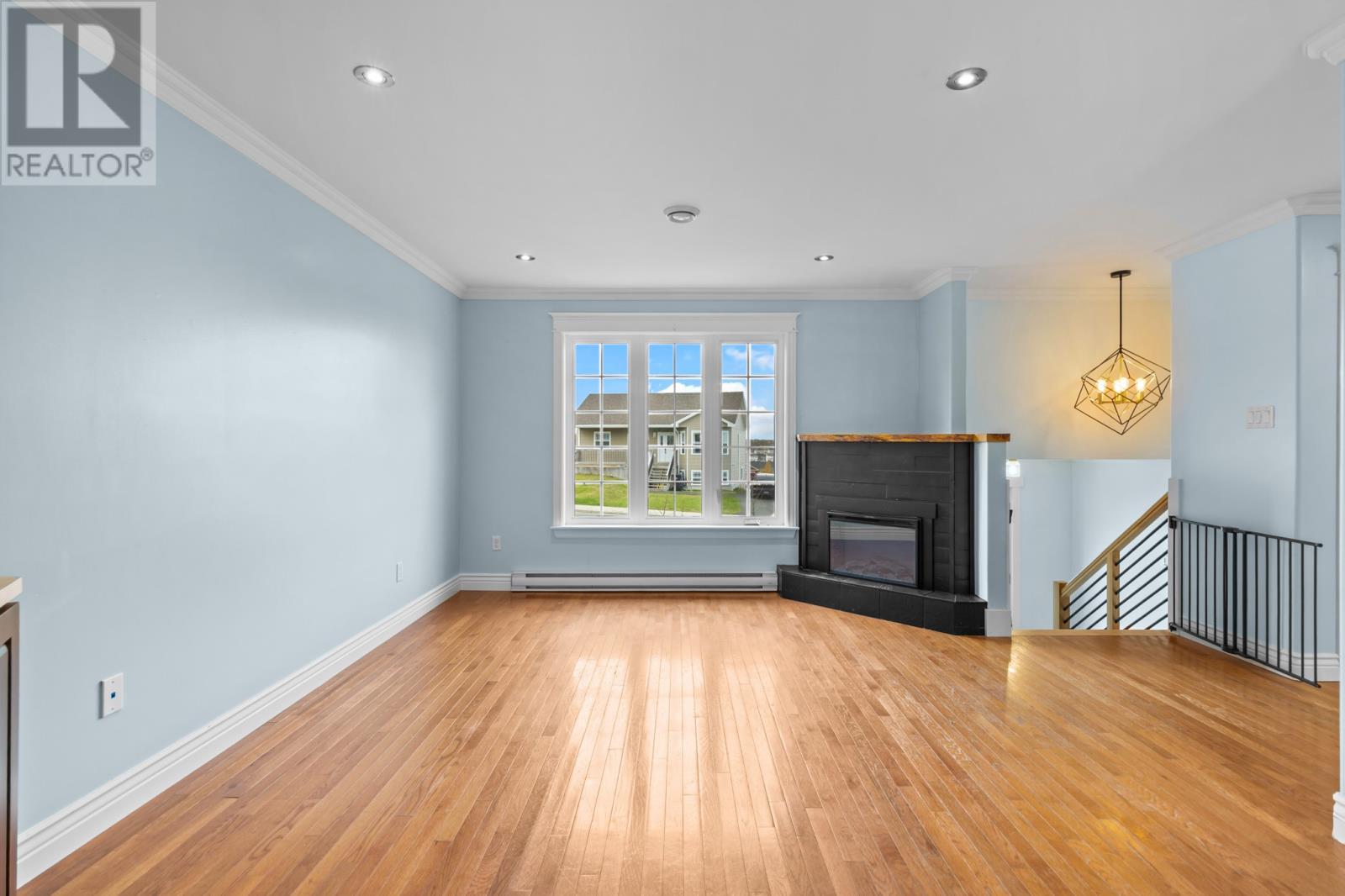 87 Cole Thomas Drive, Conception Bay South, NL - Indoor Photo Showing Living Room With Fireplace