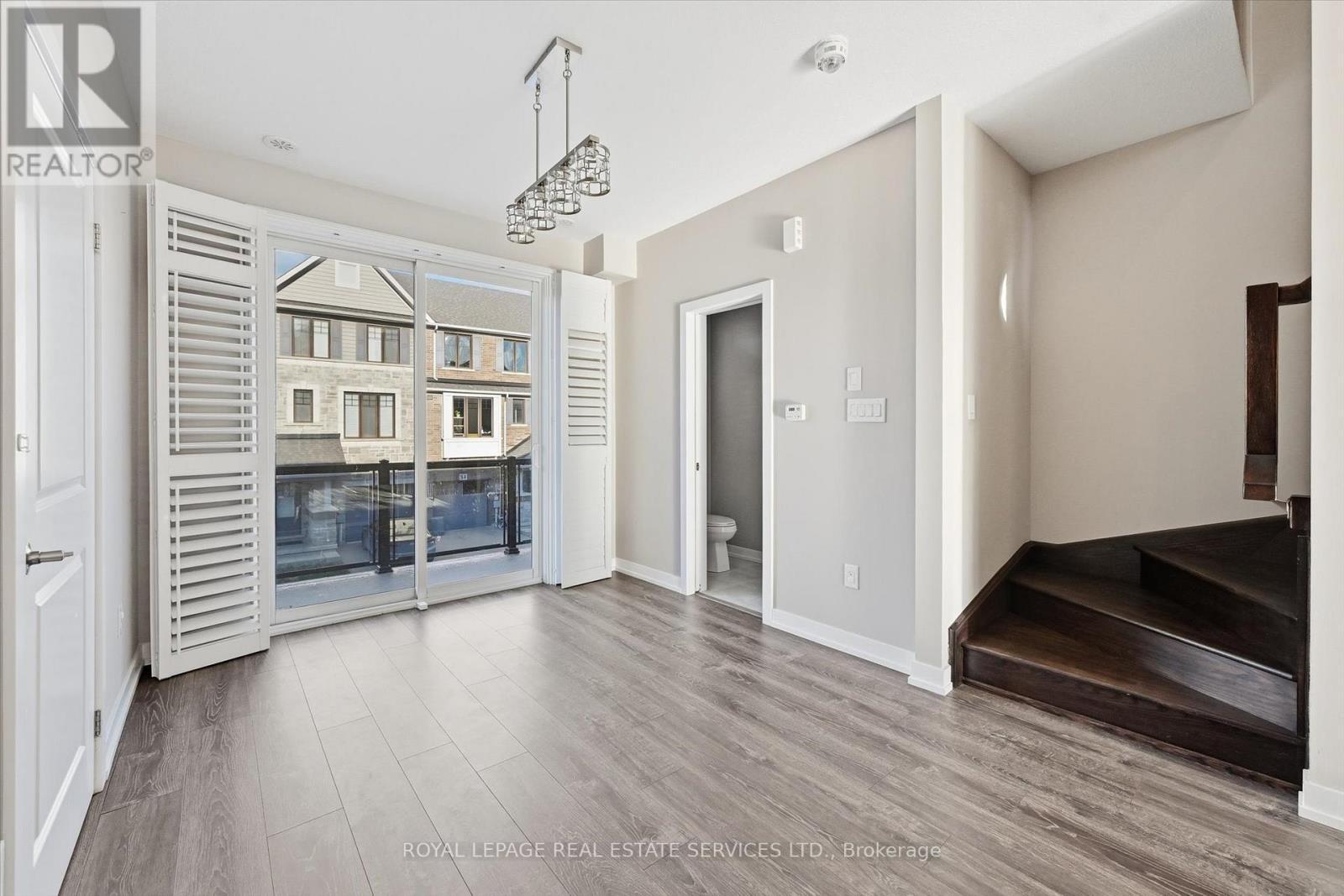 Dining Room with Walkout to a Private Balcony - 85 Esplanade Lane, Grimsby, ON - Indoor Photo Showing Other Room