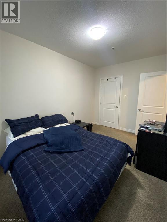 3200 Regional Road 56 Unit# 210, Binbrook, ON - Indoor Photo Showing Bedroom
