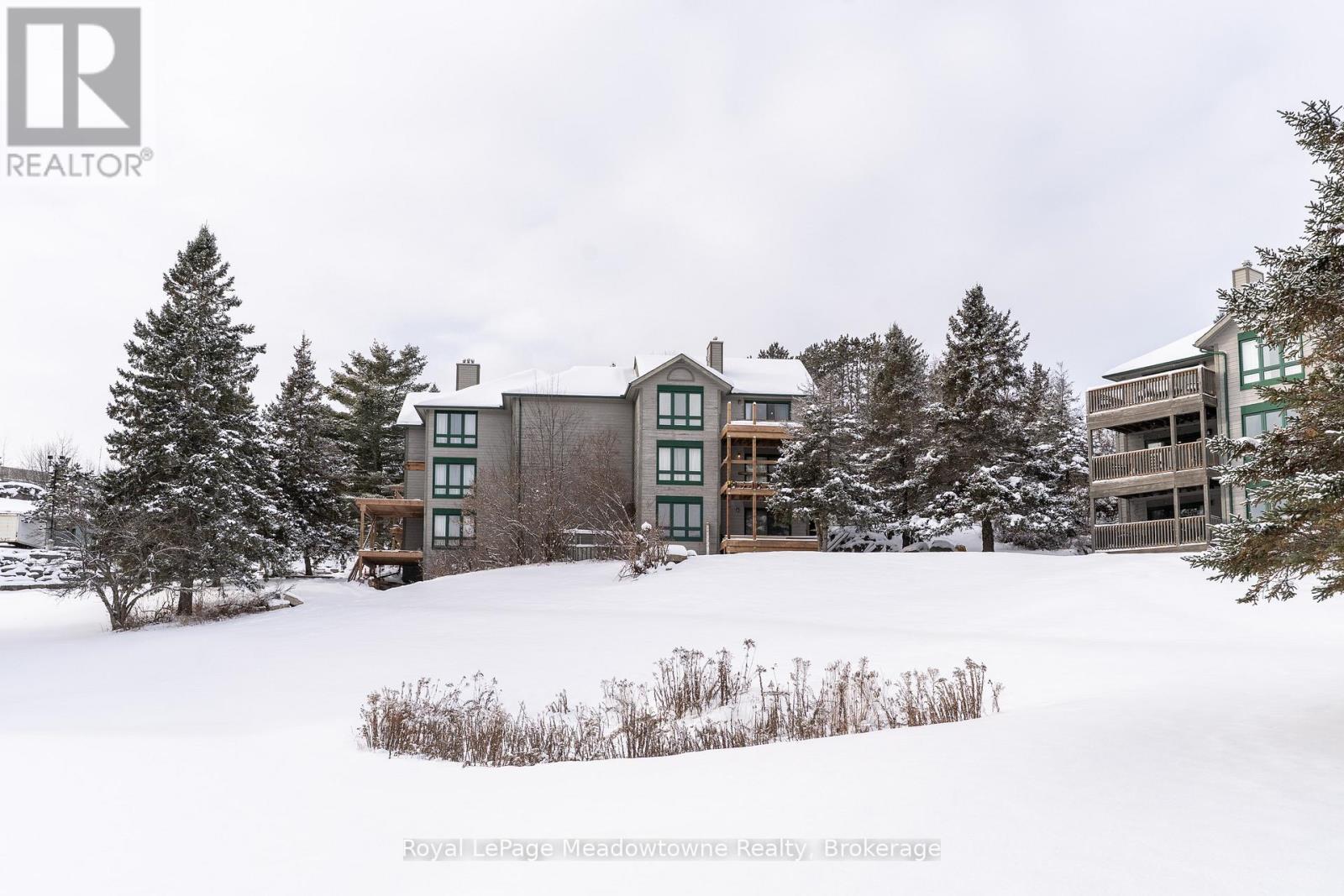 301 - 34 Deerhurst Greens Road, Huntsville (Chaffey), ON - Outdoor With Facade