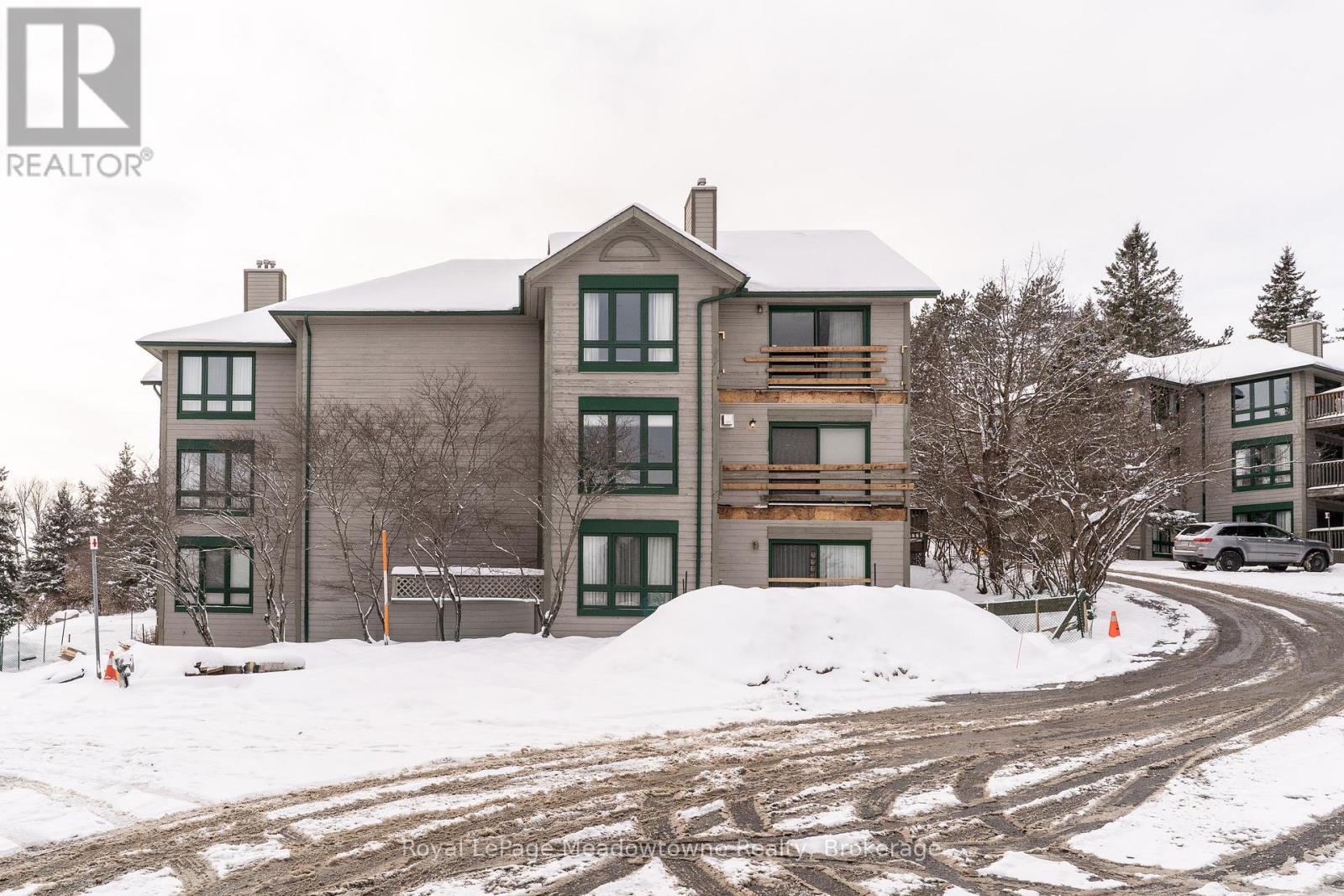 301 - 34 Deerhurst Greens Road, Huntsville (Chaffey), ON - Outdoor With Facade