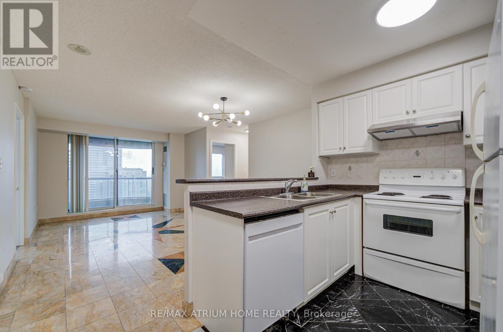 2315 - 7 Lorraine Drive, Toronto, ON - Indoor Photo Showing Kitchen With Double Sink