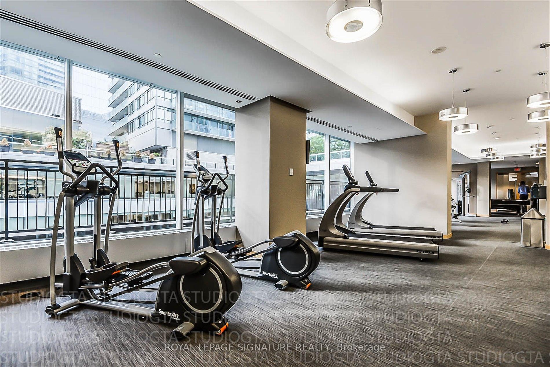 3007-55 Bremner Boulevard, Toronto, ON - Indoor Photo Showing Gym Room