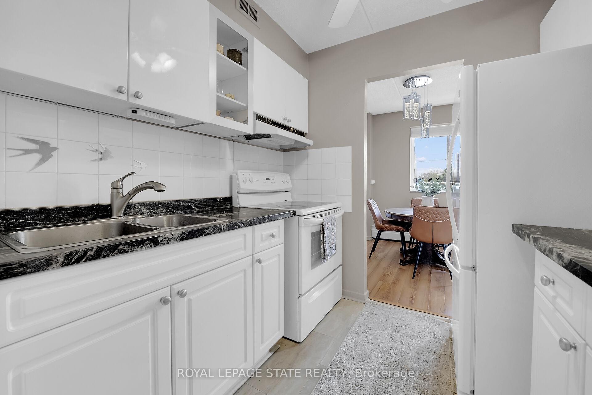 220-198 Scott Street, St. Catharines, ON - Indoor Photo Showing Kitchen With Double Sink