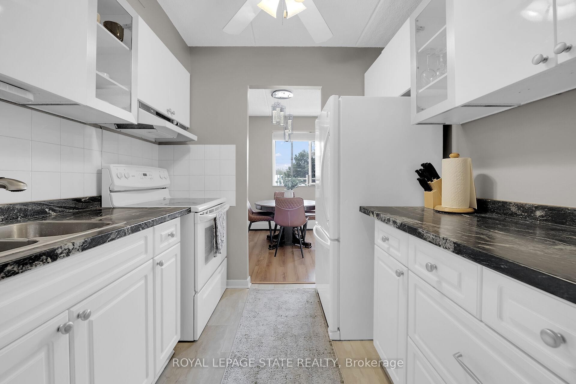 220-198 Scott Street, St. Catharines, ON - Indoor Photo Showing Kitchen With Double Sink