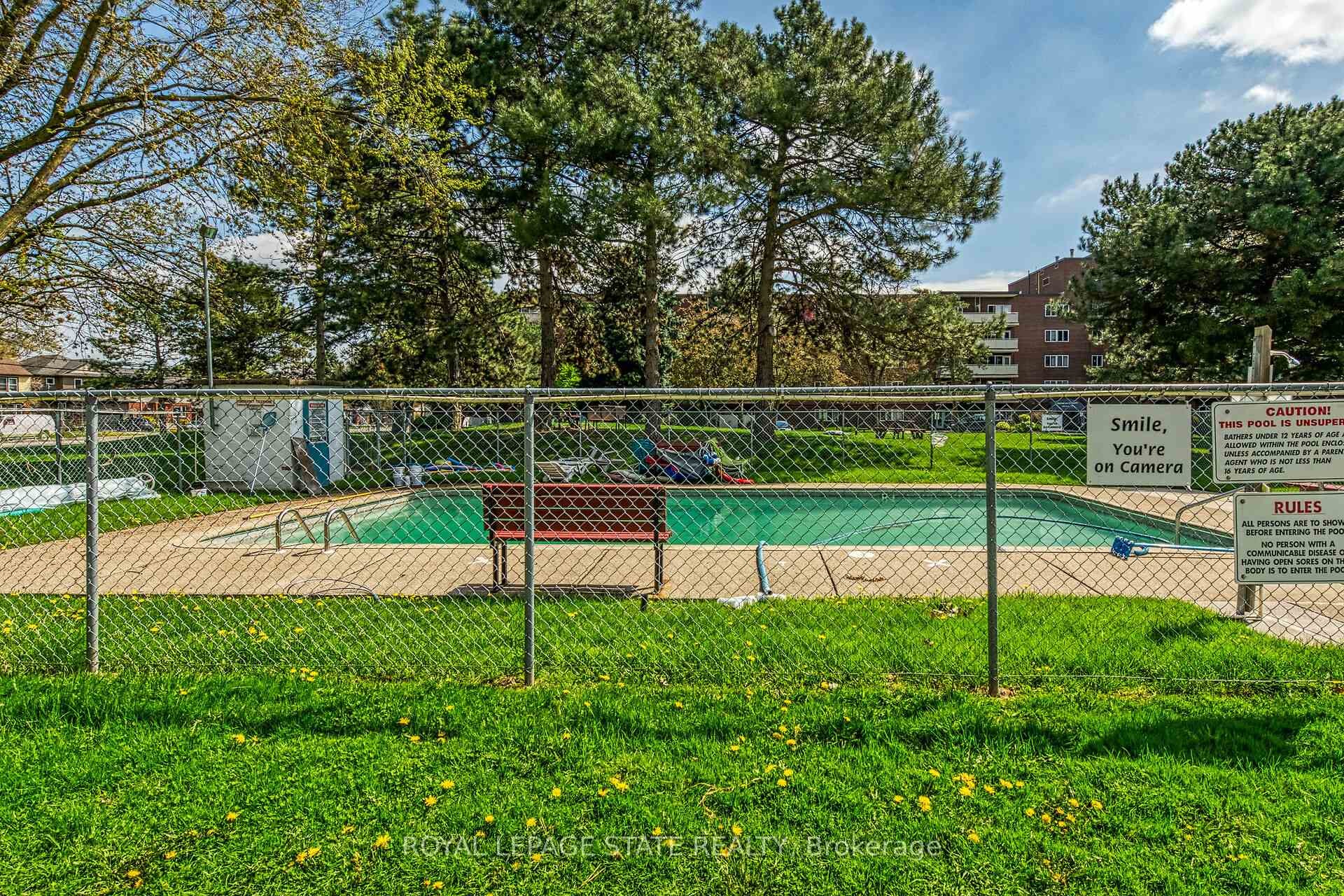 220-198 Scott Street, St. Catharines, ON - Outdoor With In Ground Pool