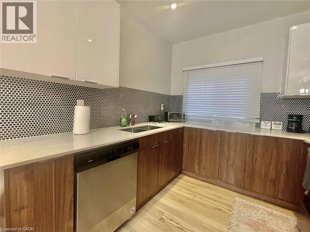 25 Krug Street Unit# 1, Kitchener, ON - Indoor Photo Showing Kitchen With Double Sink