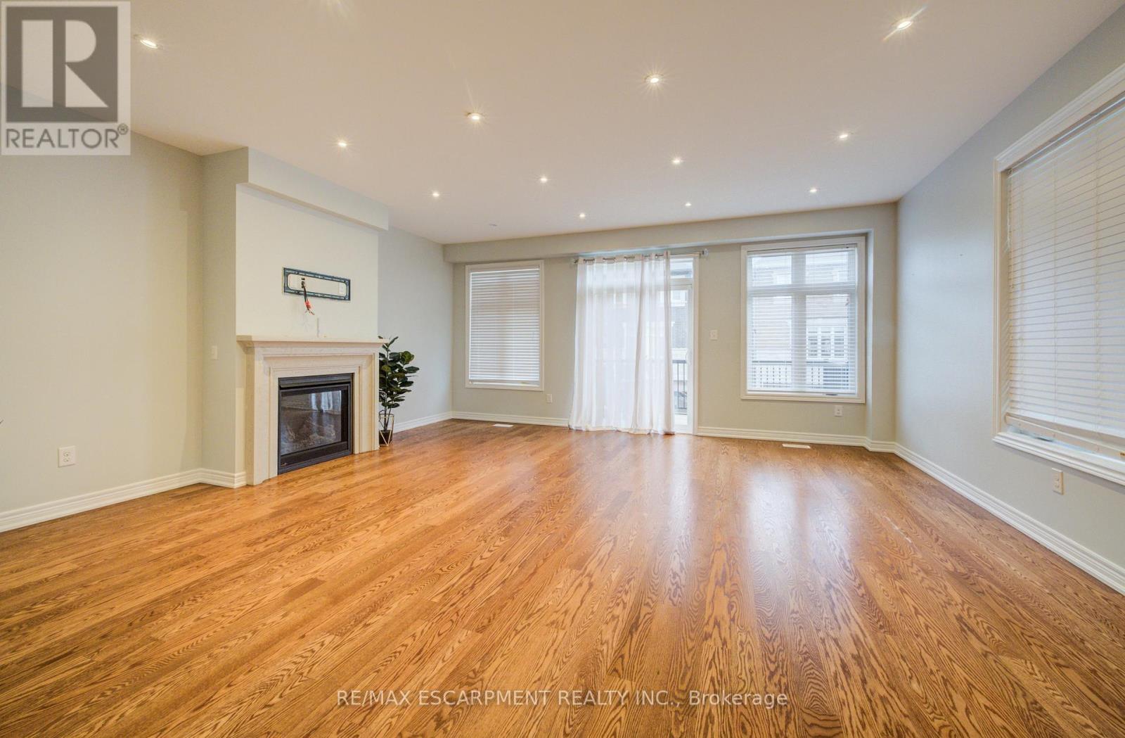 2285 Khalsa Gate, Oakville, ON - Indoor With Fireplace