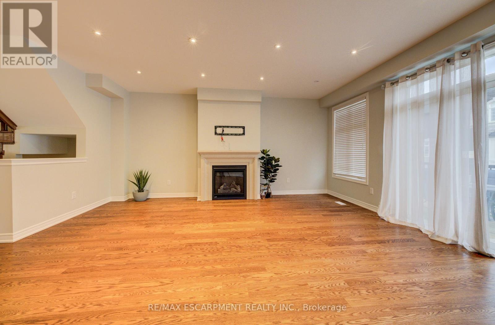 2285 Khalsa Gate, Oakville, ON - Indoor With Fireplace