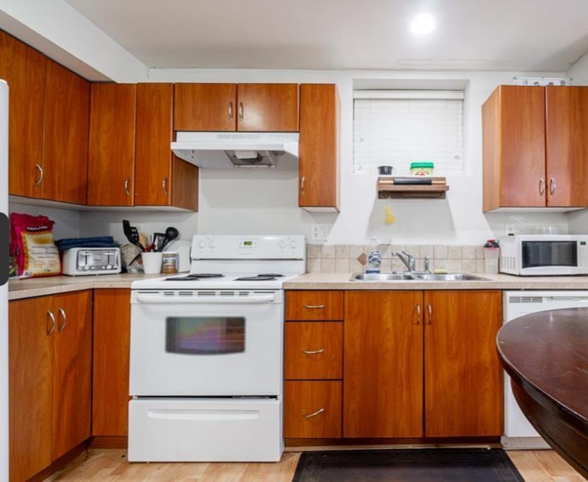 Basement 690X 190 Street, Surrey, BC - Indoor Photo Showing Kitchen With Double Sink