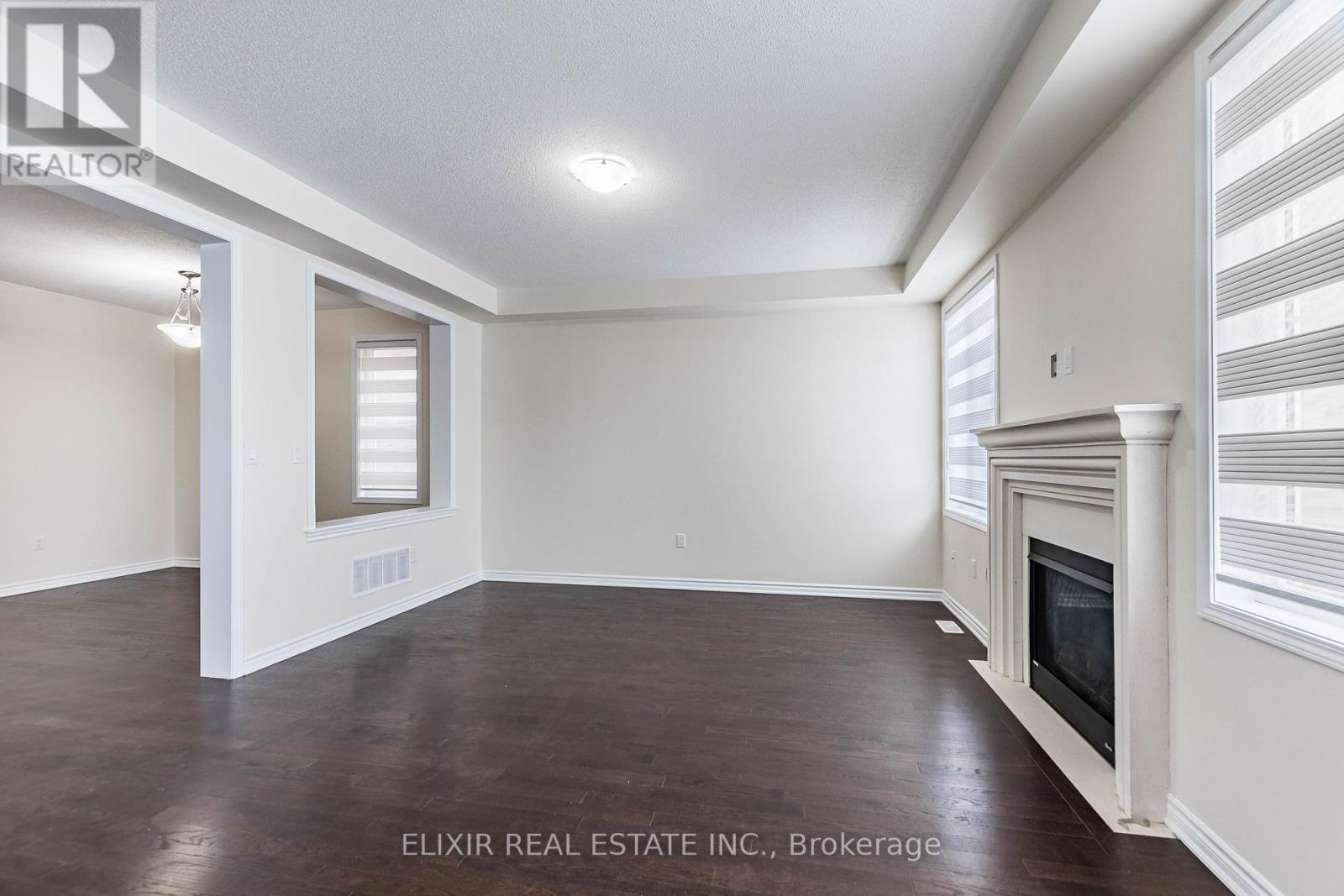 1176 Leger Way, Milton, ON - Indoor Photo Showing Other Room With Fireplace