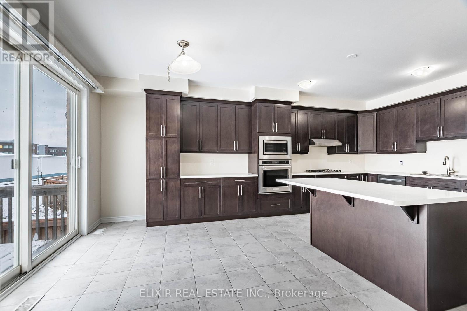 1176 Leger Way, Milton, ON - Indoor Photo Showing Kitchen With Upgraded Kitchen