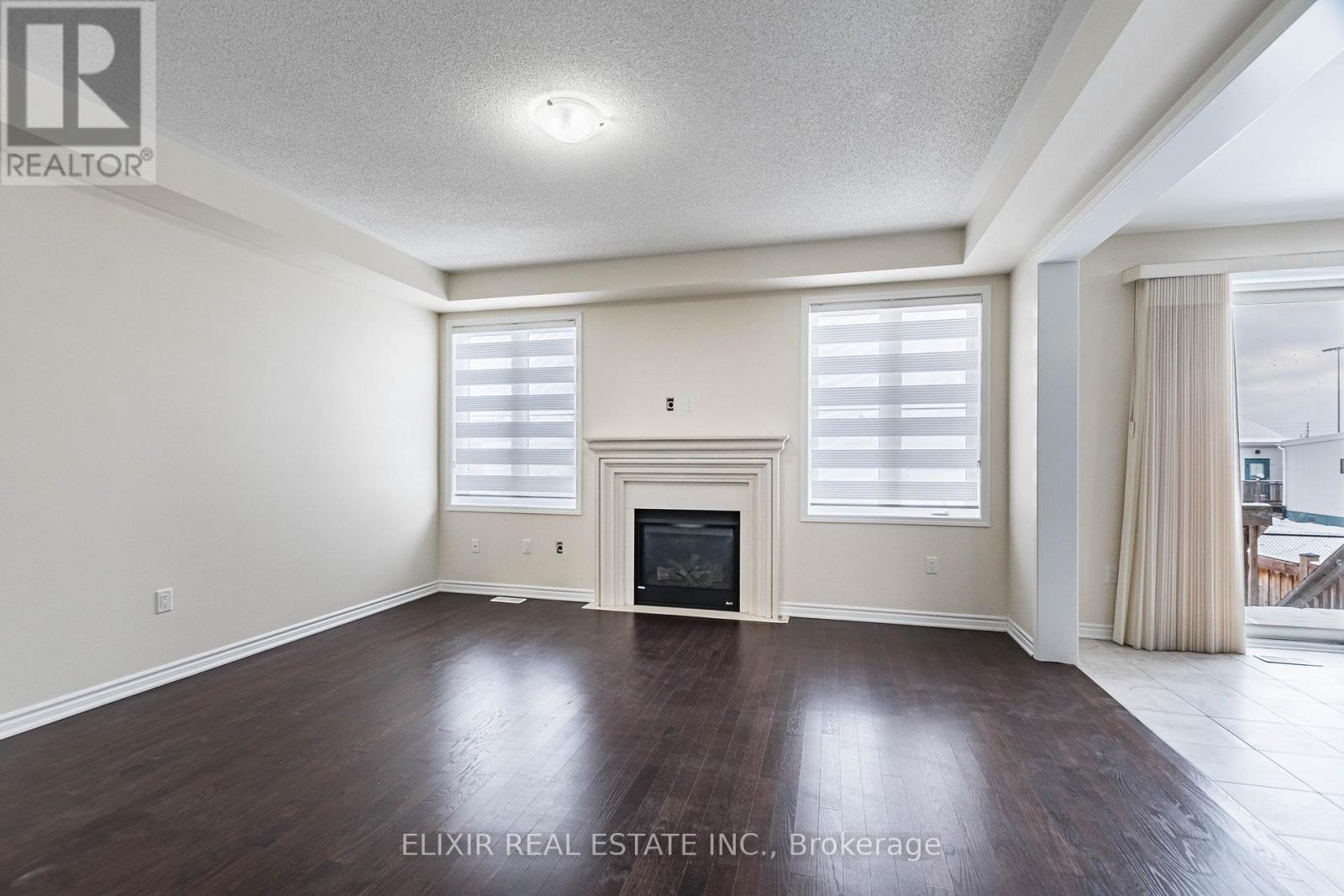 1176 Leger Way, Milton, ON - Indoor Photo Showing Living Room With Fireplace